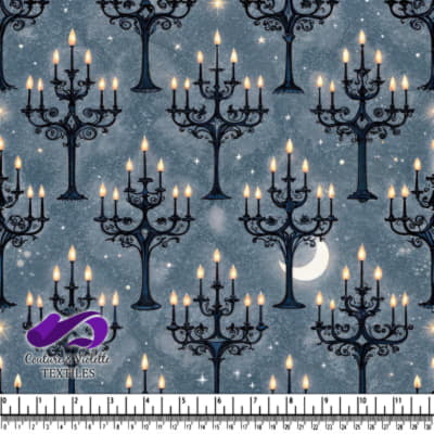 Black wrought iron candelabras with lit candles