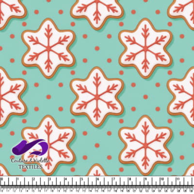 Biscuits décorés en forme de flocon de neige sur fond bleu-vert