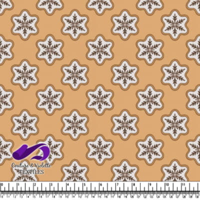 Snowflake decorated cookies on a beige background