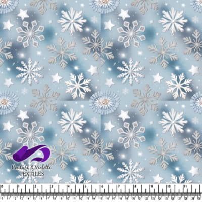Silver and white snowflakes on a soft blue winter background